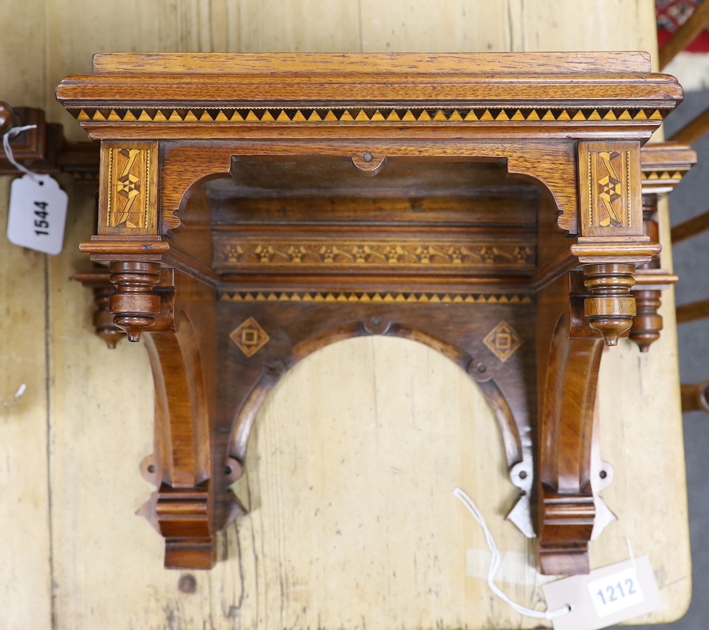 A late 19th century Arts and Crafts walnut and marquetry banded Tunbridgeware bracket clock with a German eight day quarter striking movement and bracket, clock 25cms wide x 35cms high, bracket 39cms wide x 26cms high
